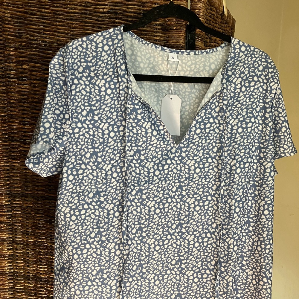 Made with Love blouse. Blue and white short sleeves with v-collar.